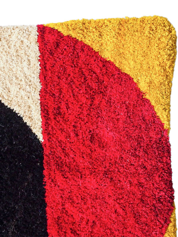 yellow, red and white cushion