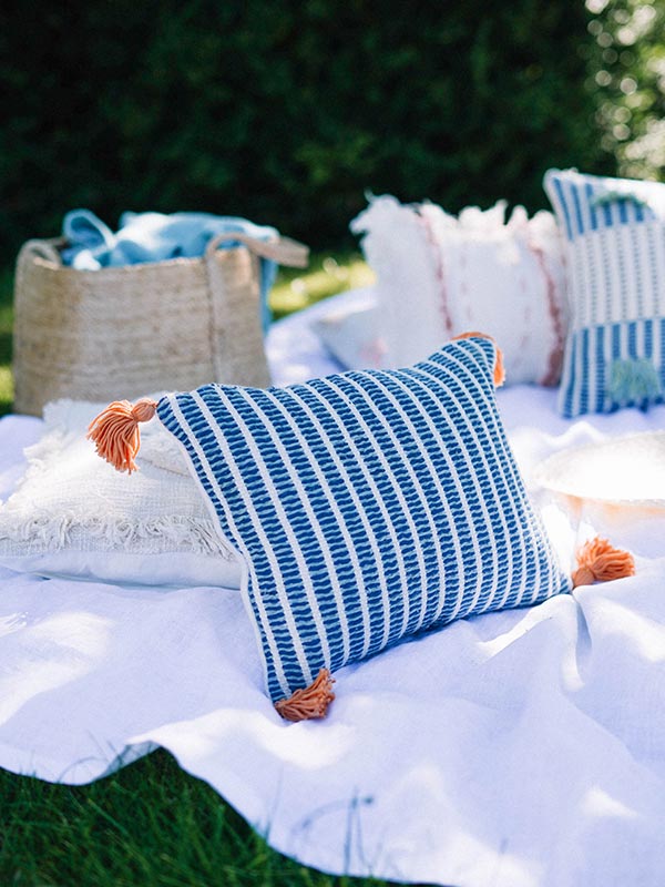 blue and white striped rectangle cushion