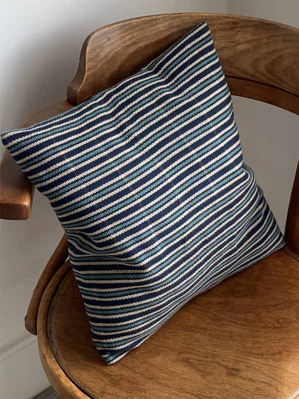 handwoven blue and white stripy cushion