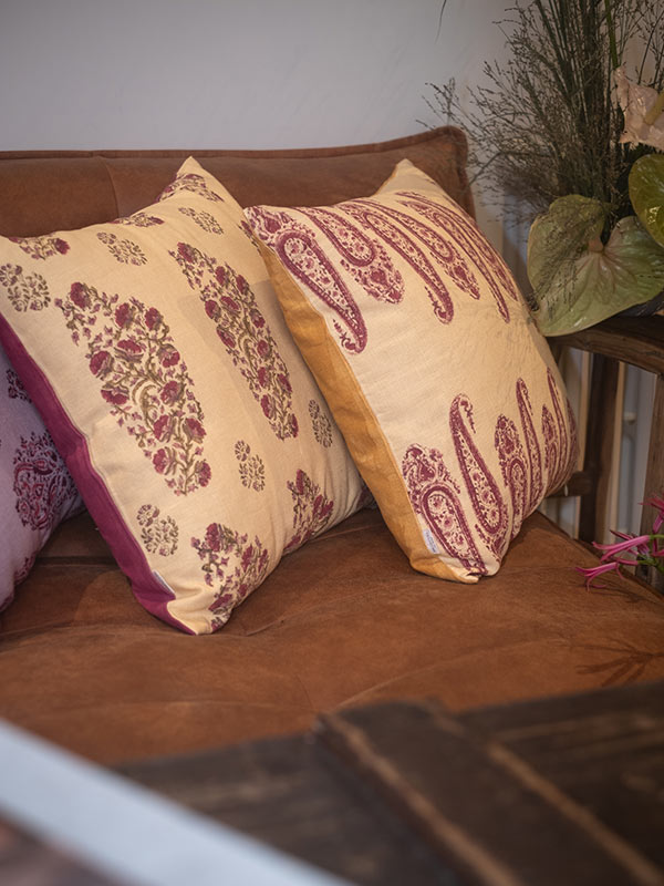 ethical hand block printed yellow and pink cushion