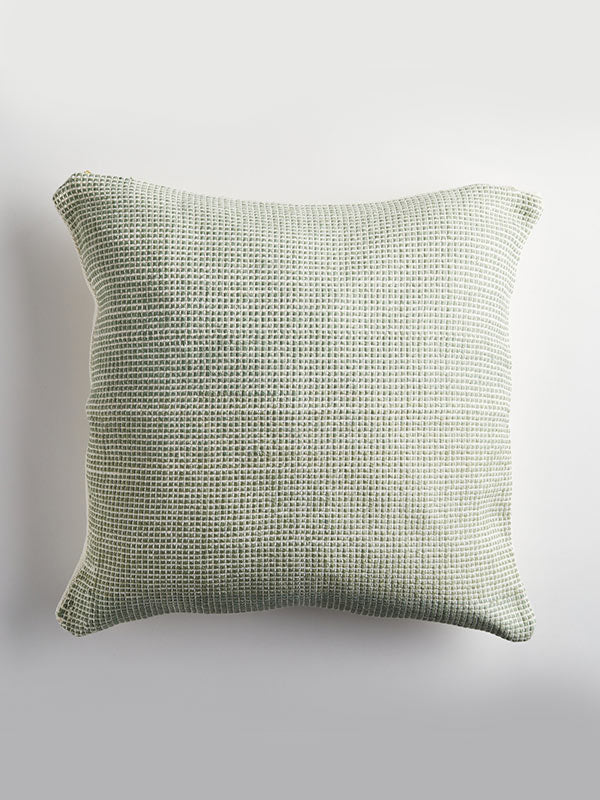 square sage green cushion