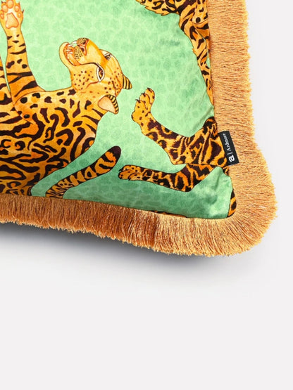 green velvet fringed wildlife cushion