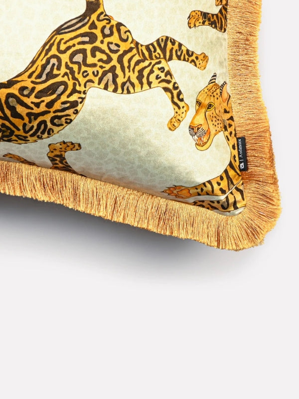 velvet print cushion with gold fringe